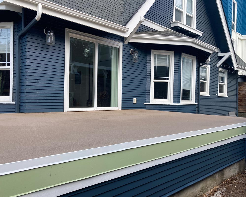 Poly deck with drip edge flashing for gutter